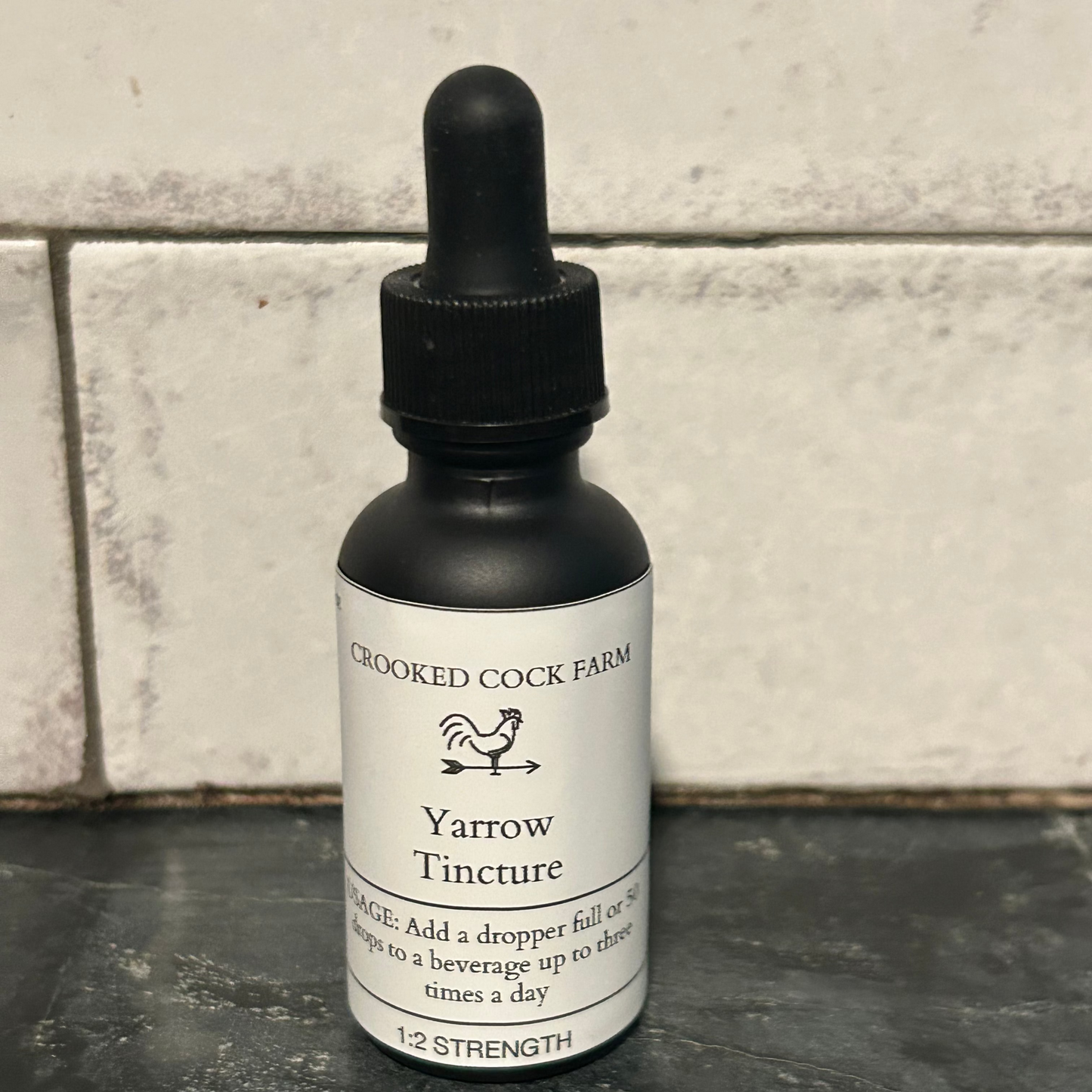 Bottle of Yarrow Tincture from Crooked Cock Farm